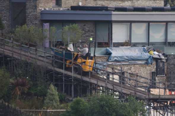 11 November 2021 - 09-02-55
Over in Kingswear there's some substantial remedial work going on at one house. This scaffolding runway is imposing, but it has to be strong enough to take a dumper truck and its load.
--------------
Dumper truck drive in Kingswear
